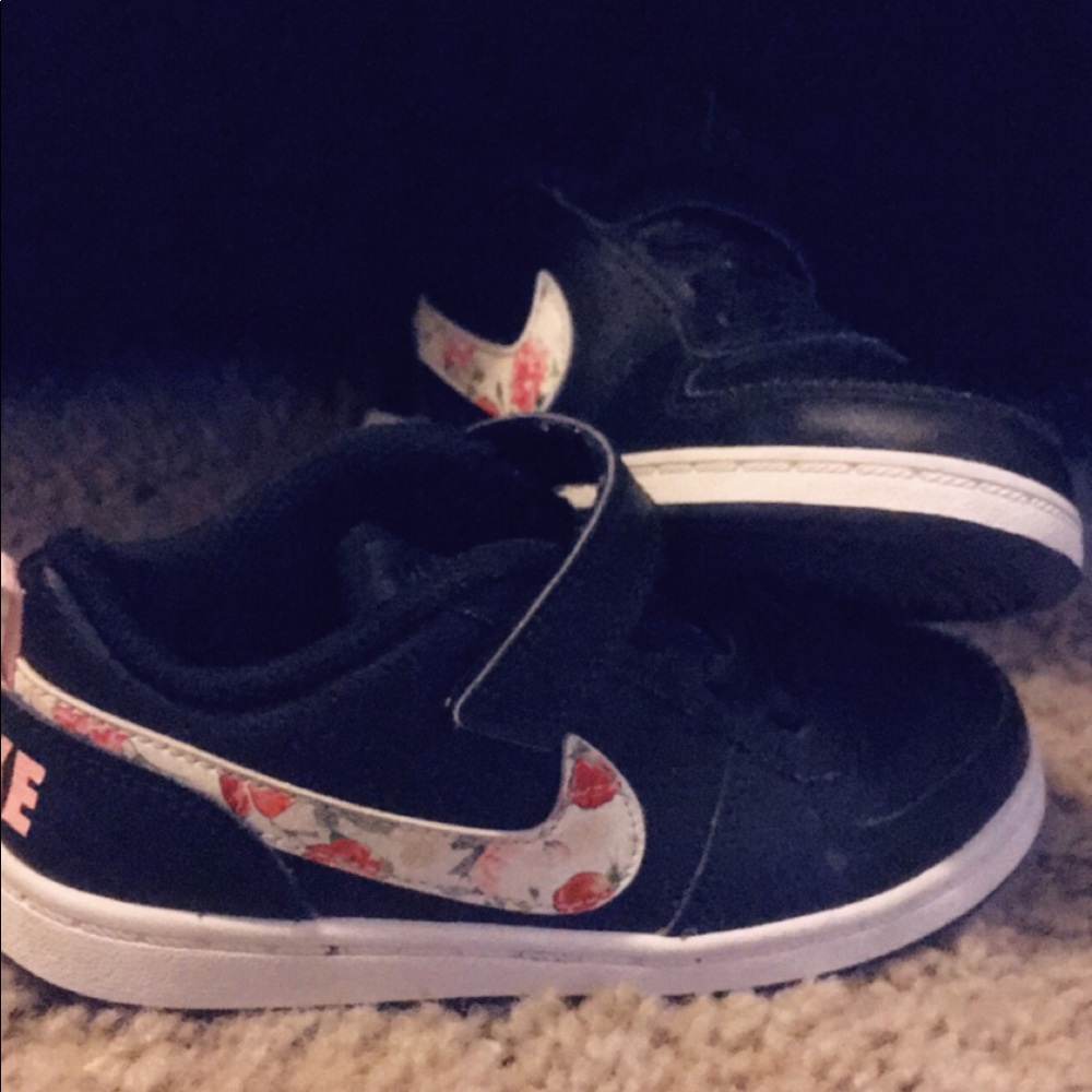Black and floral Nike toddler shoes